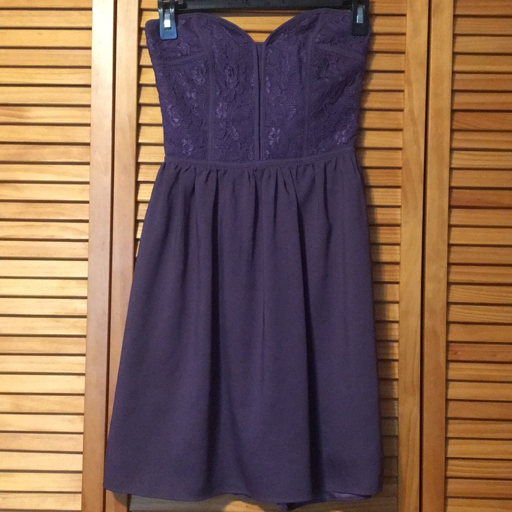 Purple strapless dress with corset upper half